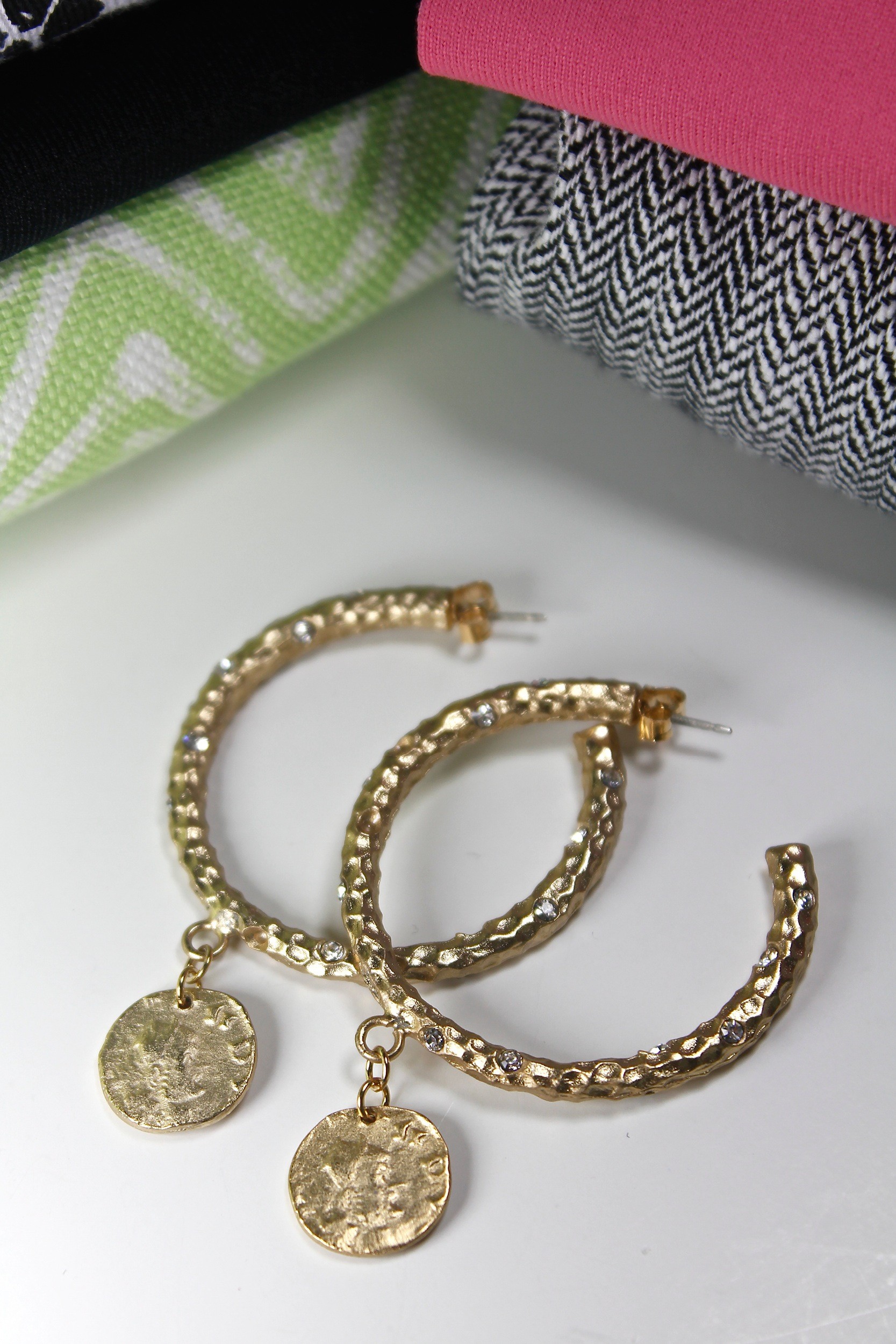 Gold hoops with charm